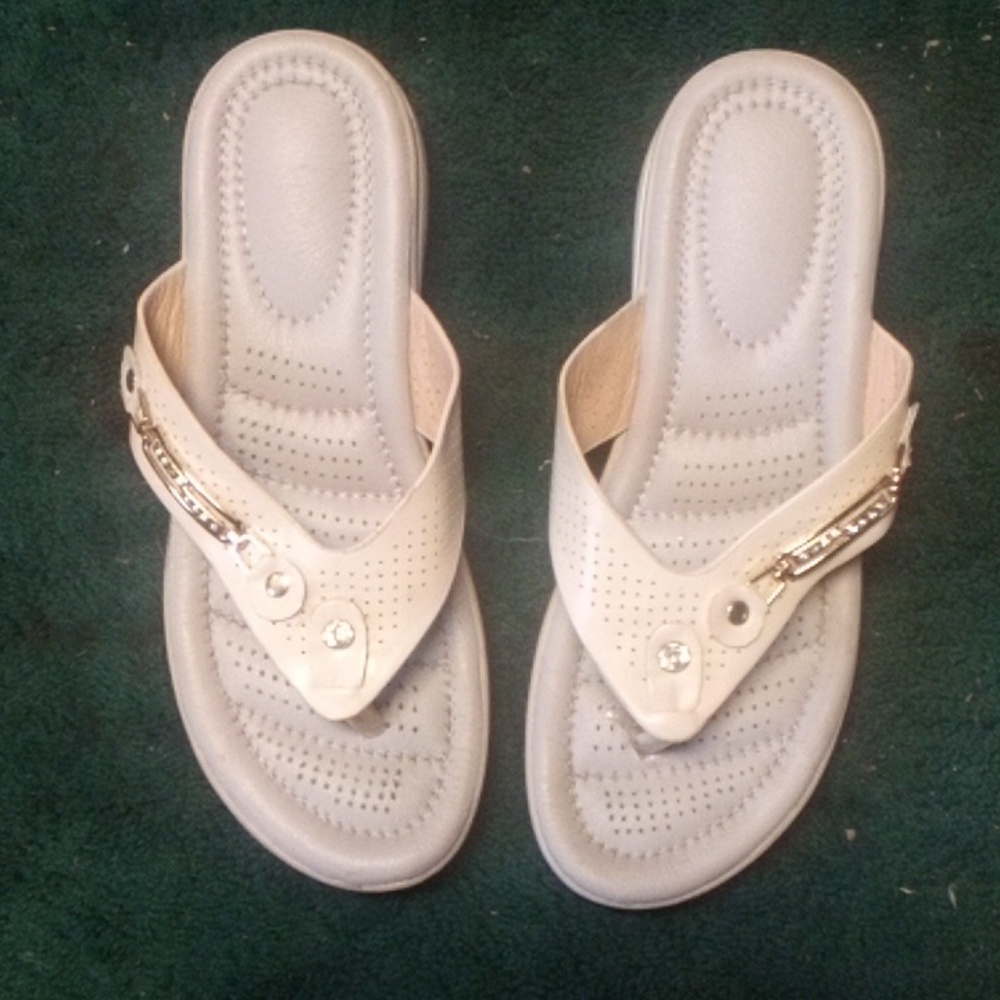 Thong style flip flops.
